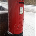 snowy red pillar box