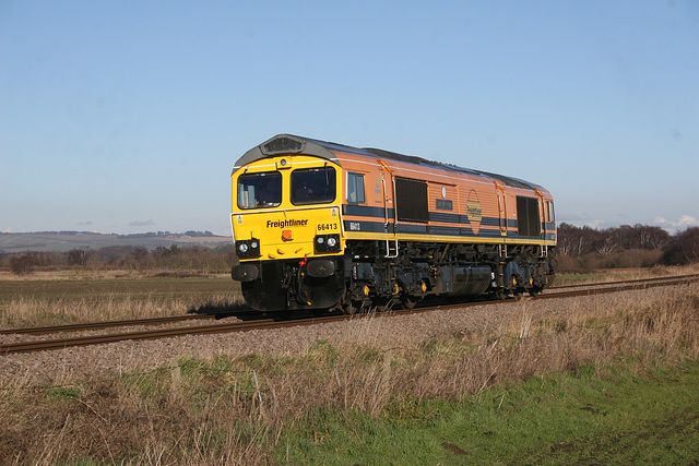 Freightliner class 66 66413 LEST WE FORGET running as 0Z33 13.05 Scarborough - York Crew training run at Willerby Carr Crossing 30th January 2019.