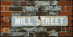 faded Mill Street sign