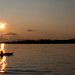 Kayaker in Sunset Beam