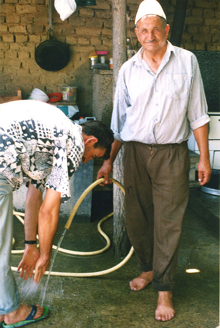 father washes feet