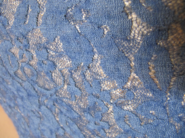 felted dress on lace (close up)