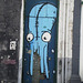 Octopus on walled door.