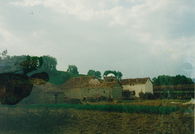 damaged farmhouse as scanned