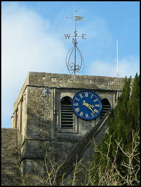 All Saints clock and weathervane