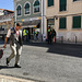 Lisbon 2018 – Postman passing street workers