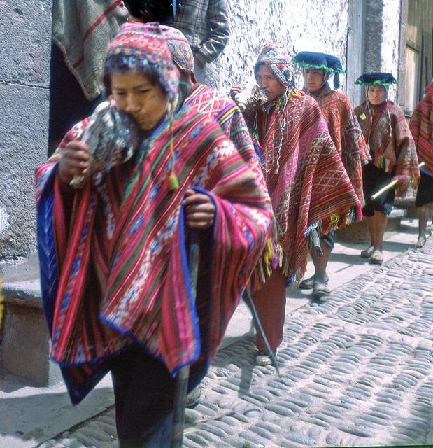 the musicians walking to the Sunday Mass in Pisac