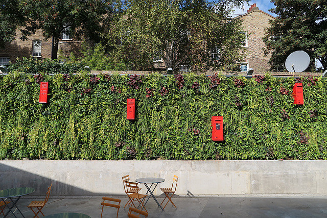 Living wall with post boxes
