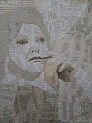 Pasted paper mural.