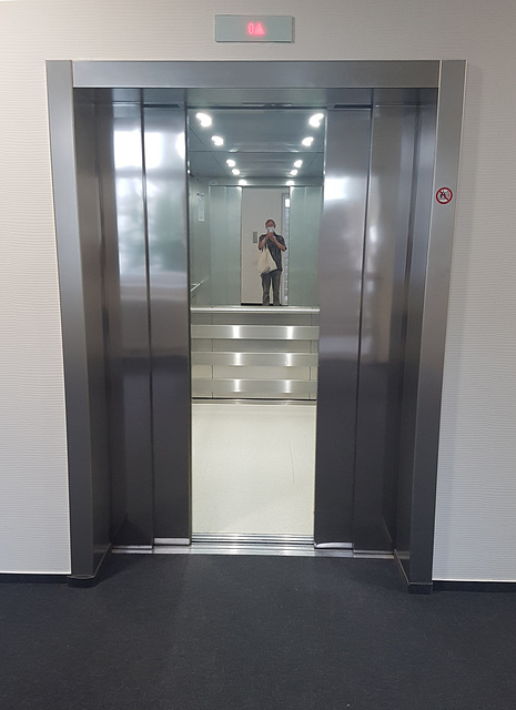 elevator  doors are closing