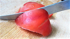 Knife Through Tomato.