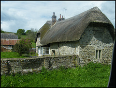 thatched stone cottage