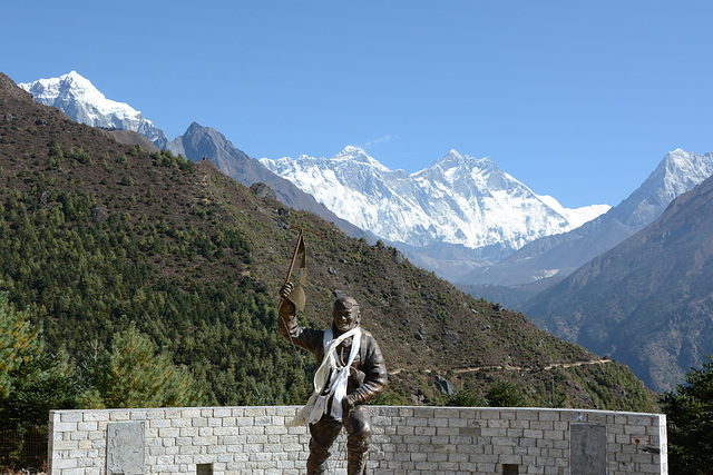 Namche Bazaar, Monument to Tenzing Norgay on the Background of Mount Everest