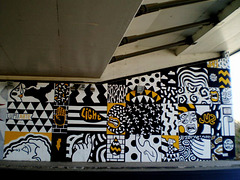 Mural painting on pillar of viaduct.