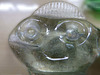 Smiling greetings from a glass  Alien