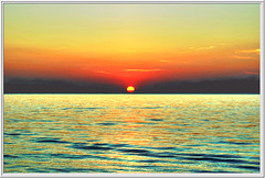 Sunset at sea. ©UdoSm