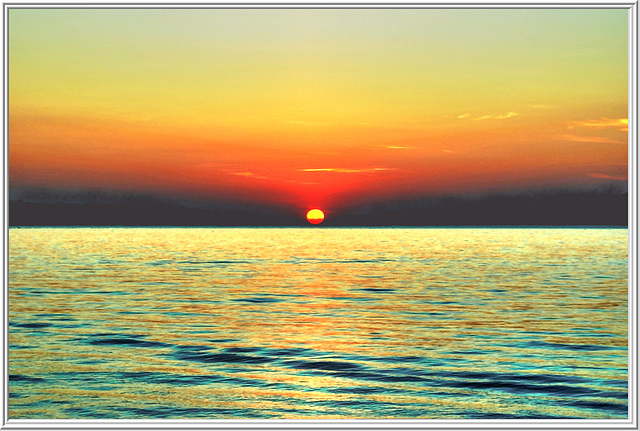 Sunset at sea. ©UdoSm