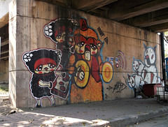Thai tag / Art animalier sur mur de ciment sous le pont