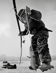 Man Icefishing.