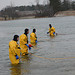 Firemen in cold-water suits in case there's a problem