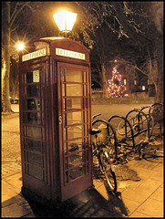 old phone box at night
