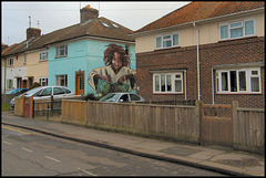 eyesore mural on side of house