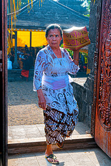 Worshiper woman enters the temple complex
