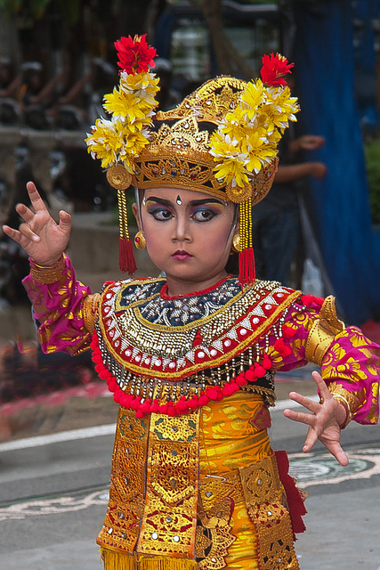 Young girl Legong dancing