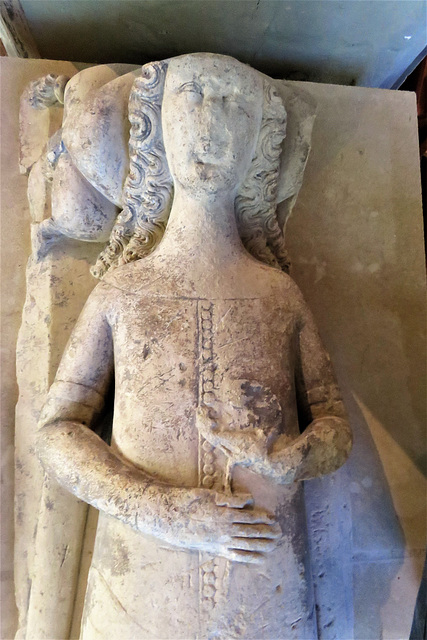 abergavenny priory, gwent,effigy of a hastings lady with a pet squirrel on a chain, early c14
