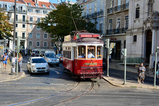 Lisbon 2018 – Tourist tram on the Largo da Chiado waiting to enter Praça Luis de Camões