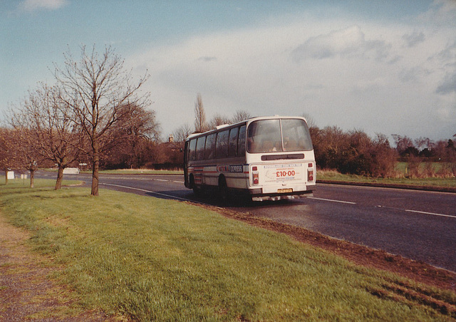 Ambassador Travel LL757 (SPW 103R) at Barton Mills – 13 Apr 1985 (14-5)