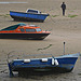 Man and boats at high tide