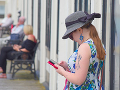 Woman with Hat and Phone