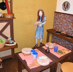 Girl with the big breads in her kitchen!