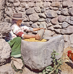 Smile while grinding corn in Ayacucho- Perú