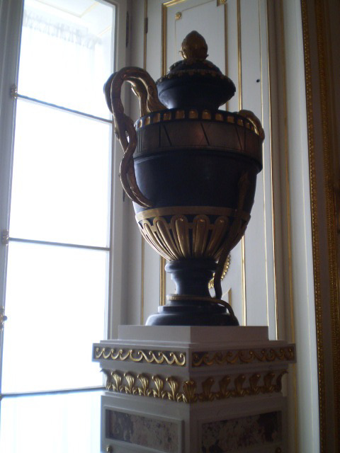 Vase by the window.