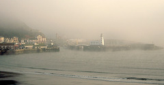 Early morning fog shrouds Scarborough Harbour