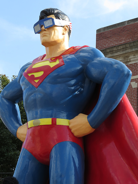 Superman wearing his eclipse glasses