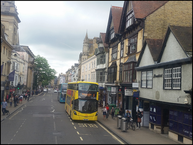 yellow bus in the high street