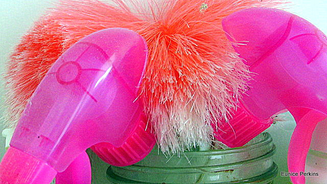 Duster And Spray Bottle Tops In A Jar