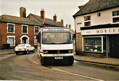 Neal’s Travel J832 RNK in Mildenhall – 2 Apr 1994 (218-21)