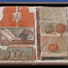 Still Life Fragment with a Vase, Scroll, Landscape and Fruit Fresco from Herculaneum at ISAW, May 2022
