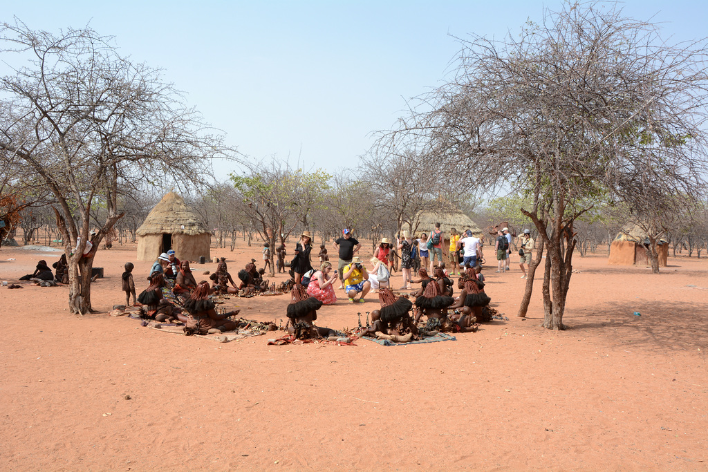 Namibia, Tourists in the Traditional Himba Village of Onjowewe
