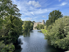 View along the river Avon to Warwick Castle UK