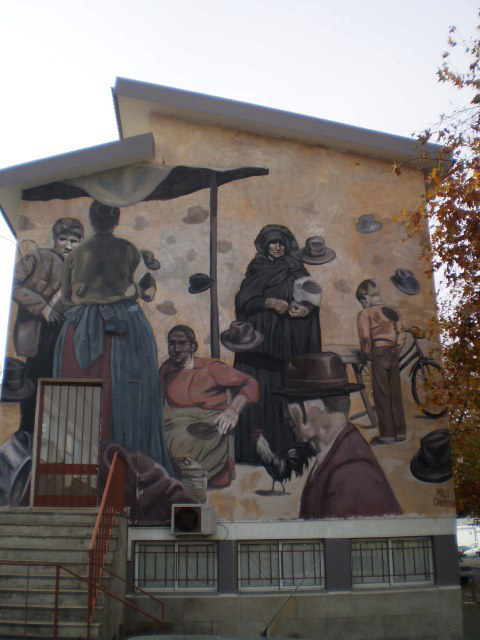 Mural with market scene.