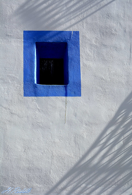 Blue in white window