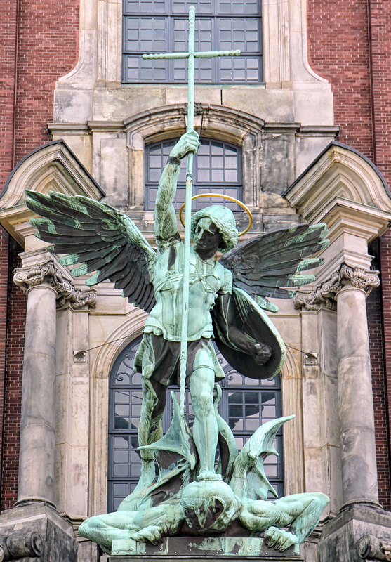 Archangel Michael  Defeats satan with a Cross-shaped Lance