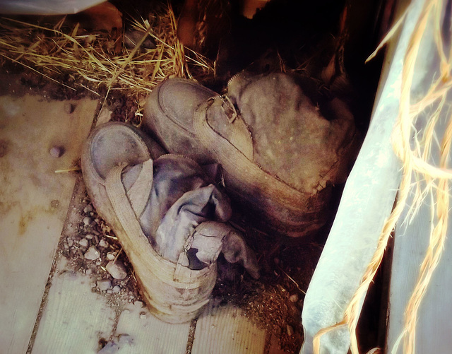 Boots, abandoned barn