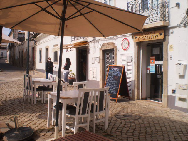 Outdoor tables set for lunch.