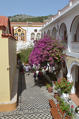 In the Courtyard of the Panormytis Monastery on the Island of Symi